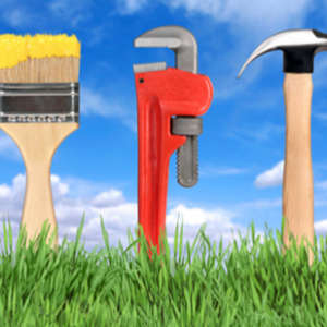 paintbrush, wrench and hammer