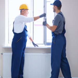 two men installing windows 